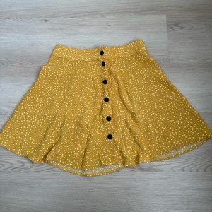Yellow polka dotted mini skirt